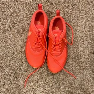 Nike bright orange Athletic shoes